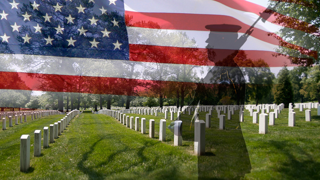 Grave stones in a row with a soldier silhouette and a US National flag Grave stones in a row with a soldier silhouette and a US National flag